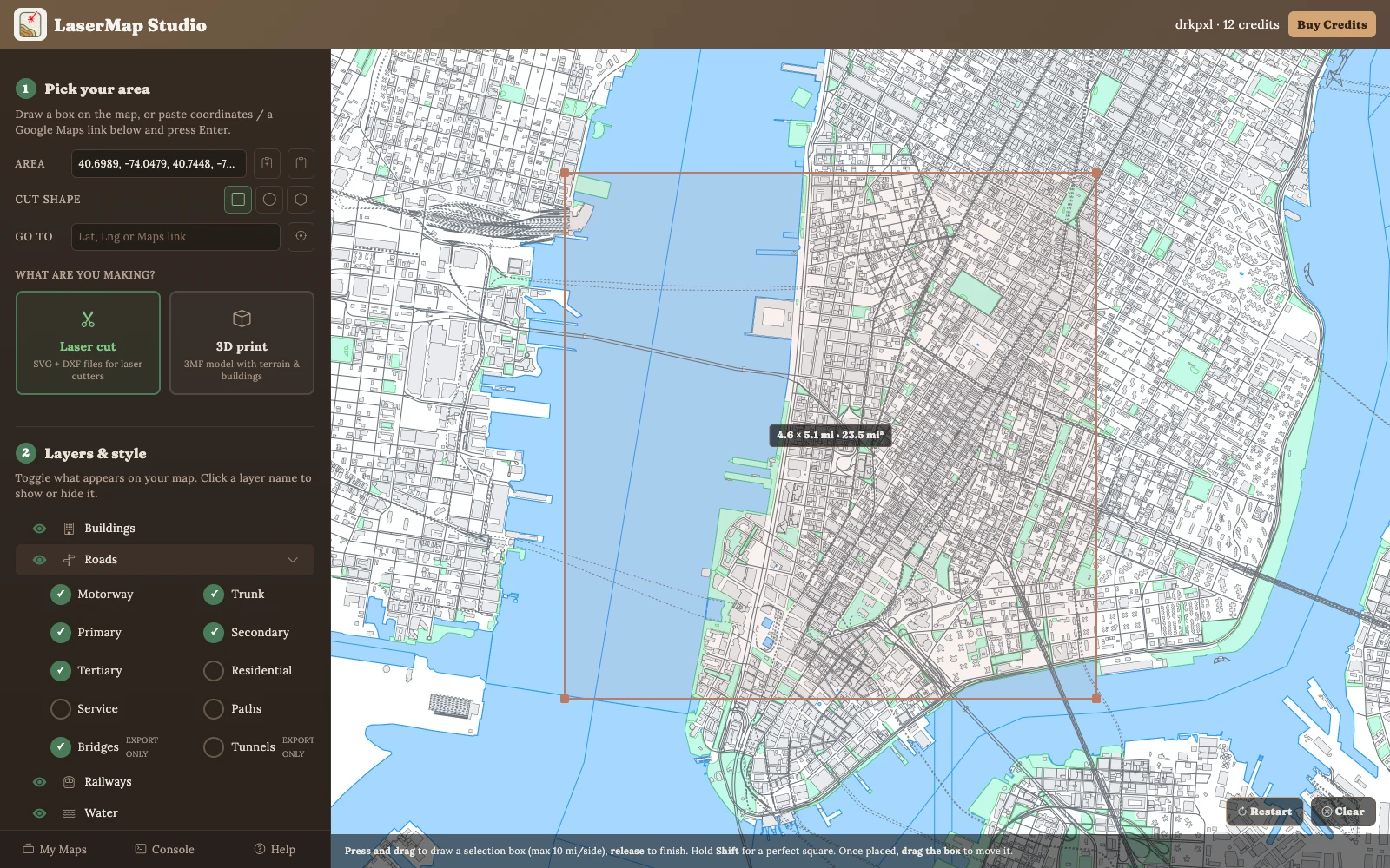 The studio's free 2D preview showing a Lower Manhattan map in laser-cut mode